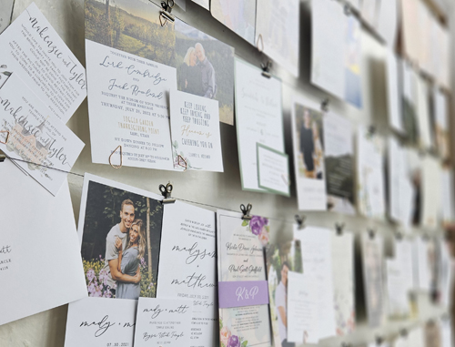 wall of wedding invitations